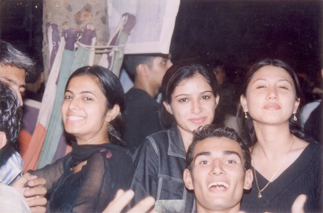 Friends squeezed into one photo, laughing